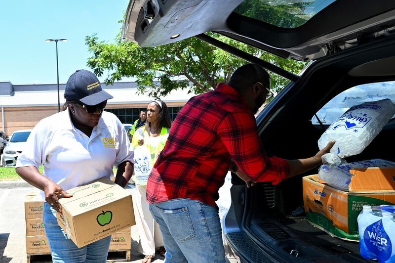 Frustrated residents scrambled for supplies, power and shelter (Maria Lysaker/AP)