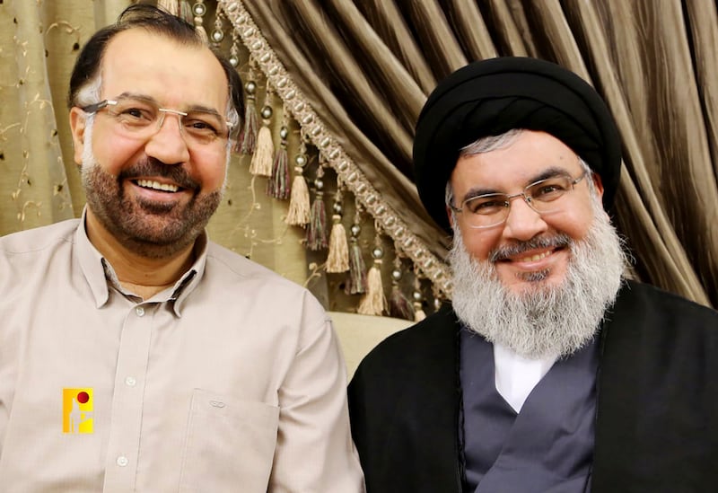 Hezbollah leader Hassan Nasrallah, right, with Fouad Shukur, who was killed by an Israeli air strike (Hezbollah Military Media vía AP)