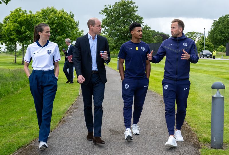 From left, Jill Scott, the Prince of Wales, Ollie Watkins and Harry Kane during a visit to St George’s Park