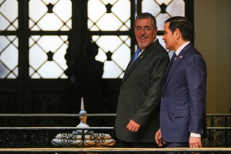 US Secretary of State Marco Rubio, right, and Guatemalan President Bernardo Arevalo at the National Palace in Guatemala City (Moises Castillo/AP)