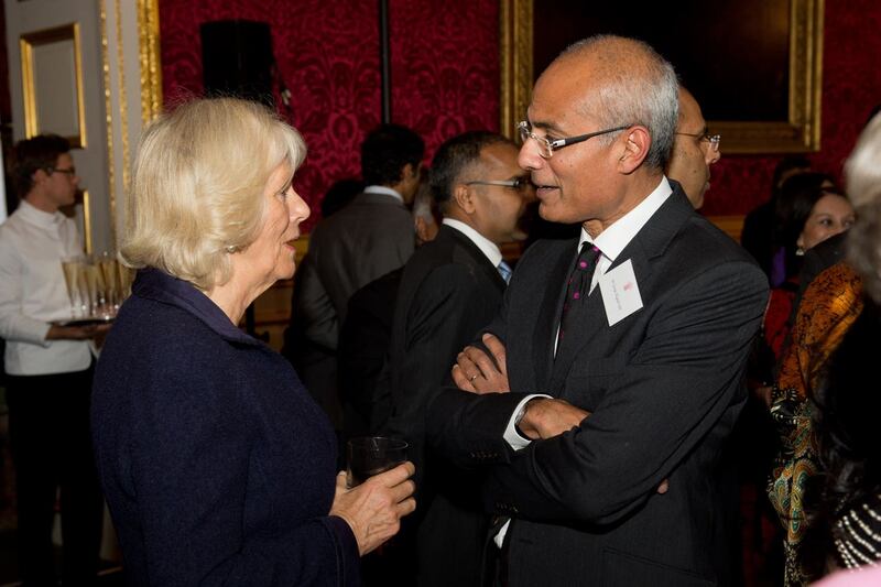 Camilla and George Alagiah speaking