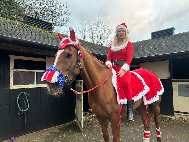 Thank You Ma’am with his festive trainer Georgie Nicholls. Fiona Browne