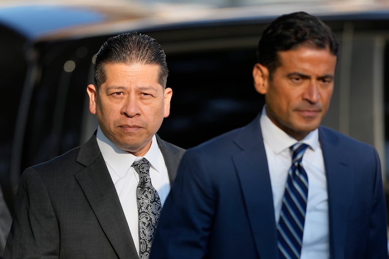 Former Uvalde Consolidated Independent School District police officer Adrian Gonzales (left) (Eric Gay/AP)