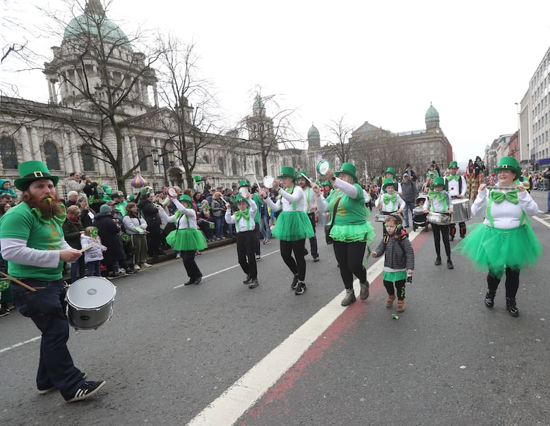 Performers entertain the crowd as  Thousands line the streets for the St Patrick’s day Parade in Belfast on Sunday.
PICTURE COLM LENAGHAN