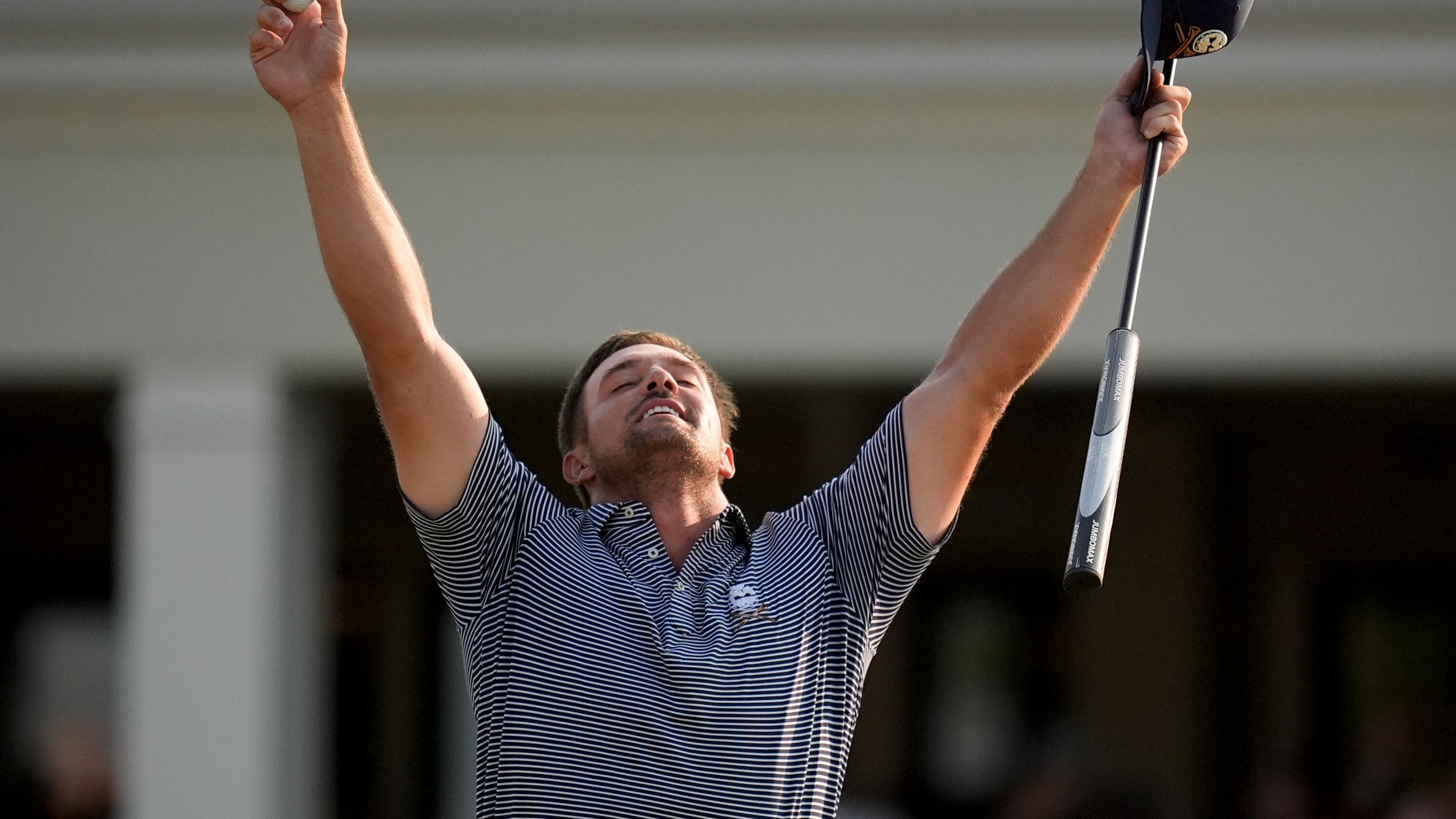 Bryson DeChambeau celebrates after winning his second US Open title (Mike Stewart/AP)