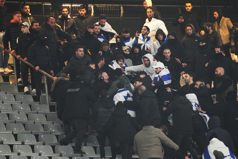 Fans clashed in the stands at the Stade de France (Thibault Camus/AP)