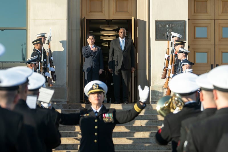 US defence secretary Lloyd Austin, centre right, with South Korean defence minister Kim Yong Hyun at the Pentagon (AP Photo/Kevin Wolf)