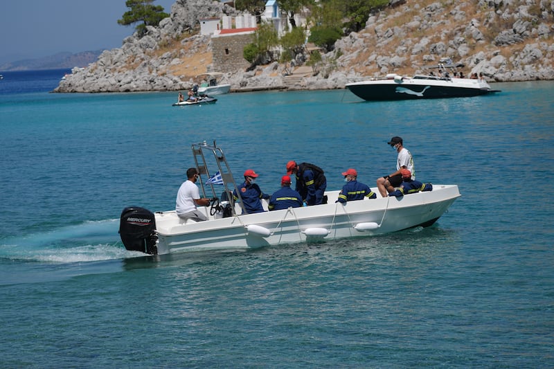 Emergency services leaving Agia Marina in Symi, Greece, where the body Michael Mosley was discovered