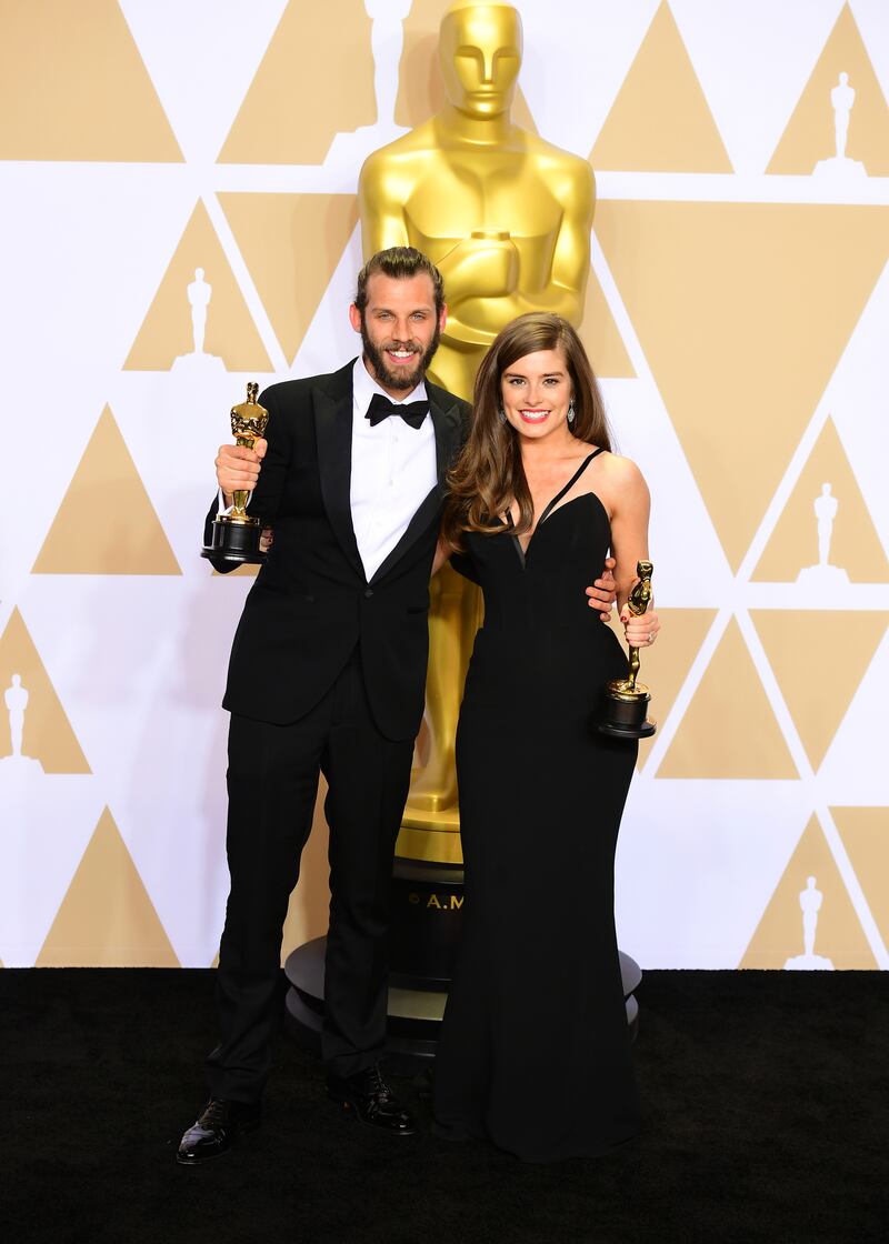 Chris Overton and Rachel Shenton with their best live action short film Oscar for The Silent Child