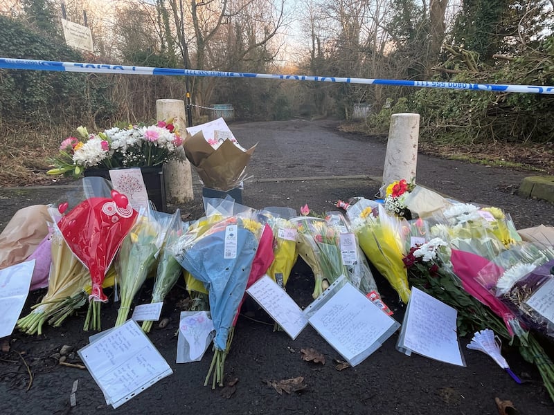 Flowers at the scene near Scribers Lane in the Hall Green area of Birmingham