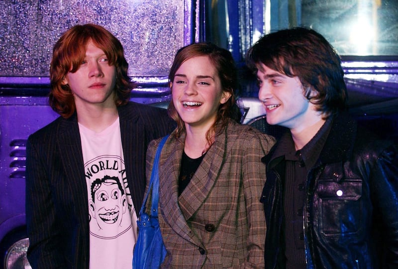 Stars of the Harry Potter films Rupert Grint, Emma Watson, and Daniel Radcliffe