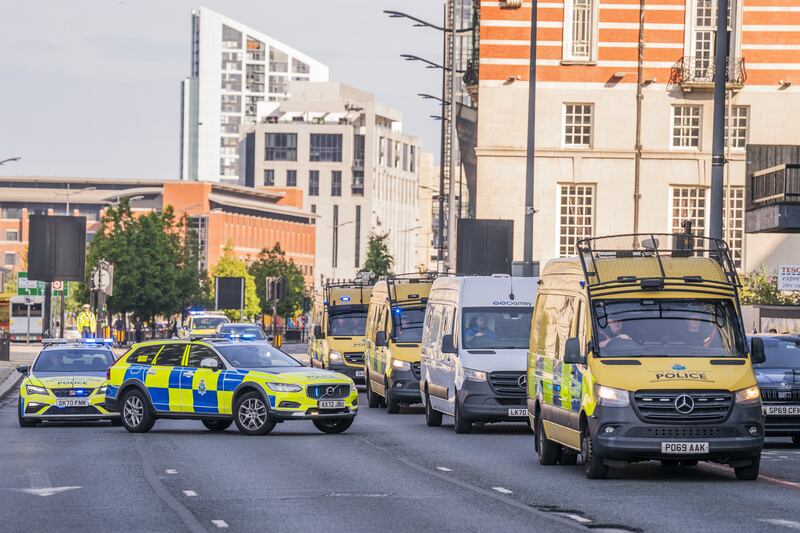 A prison van was surrounded by police vehicles as it carried Axel Rudakubana to court