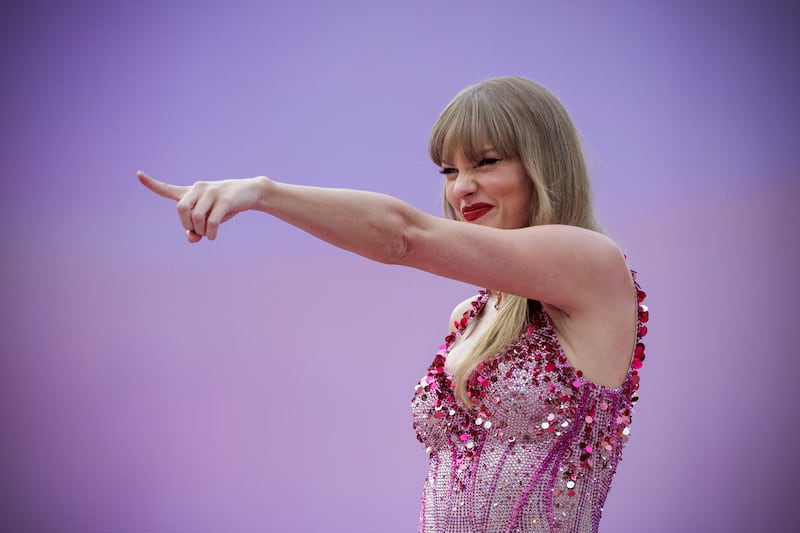 Taylor Swift performing on stage at the Aviva Stadium in Dublin, during the Eras Tour