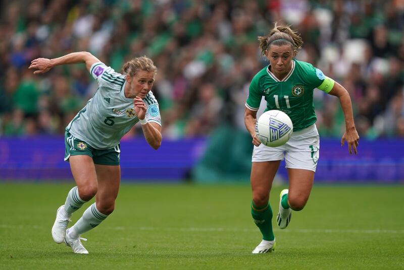 NI's Caragh Hamilton takes on Republic captain Katie McCabe at the Aviva.