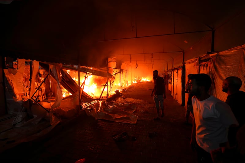 Four people died after the air strike hit a camp at Al Aqsa Martyrs hospital (AP)