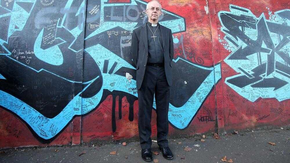 Archbishop of Canterbury Justin Welby, who visited the peace wall at Cupar Way in west Belfast last year, will be guest speaker at the Corrymeela 50th anniversary service 