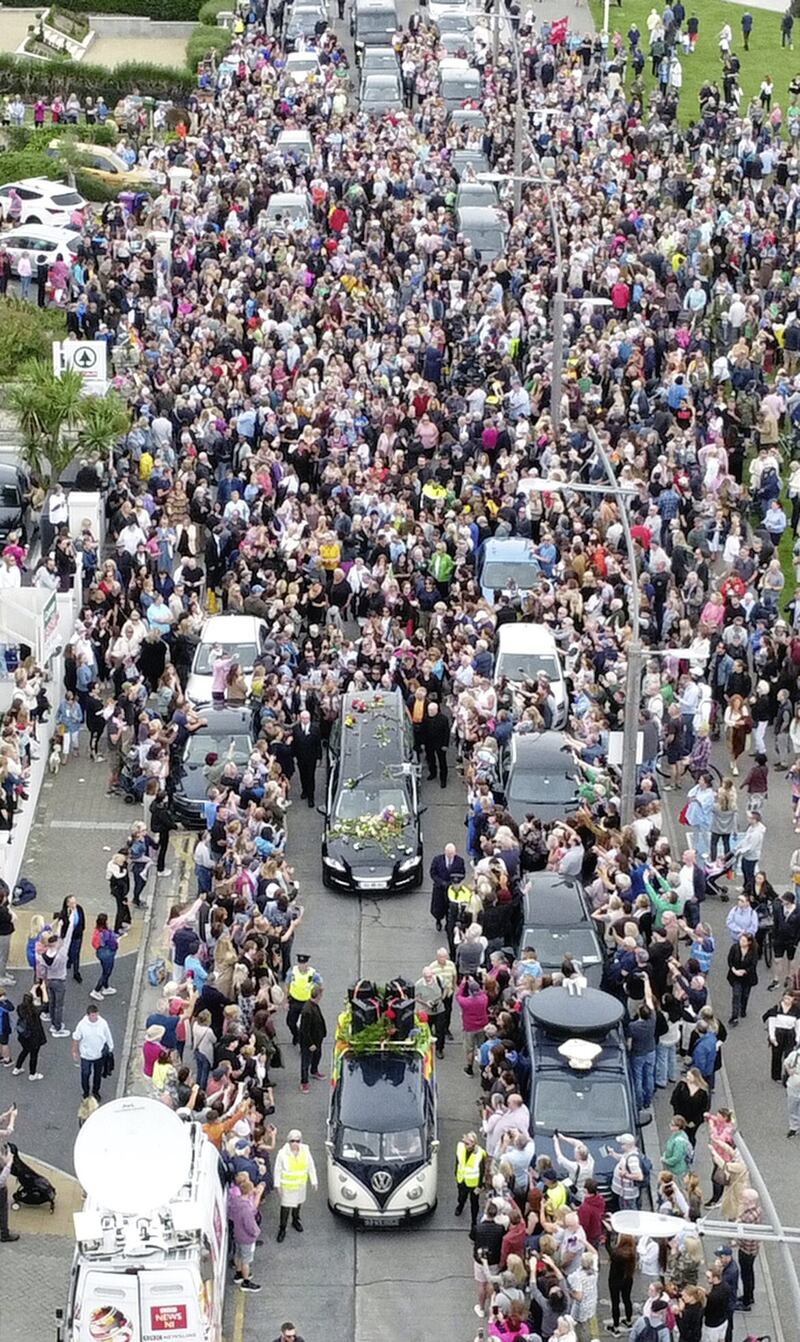 Fans of Sinéad O'Connor line the streets as her funeral cortege passes through her former hometown of Bray, Co Wicklow. Picture by Niall Carson/PA Wire