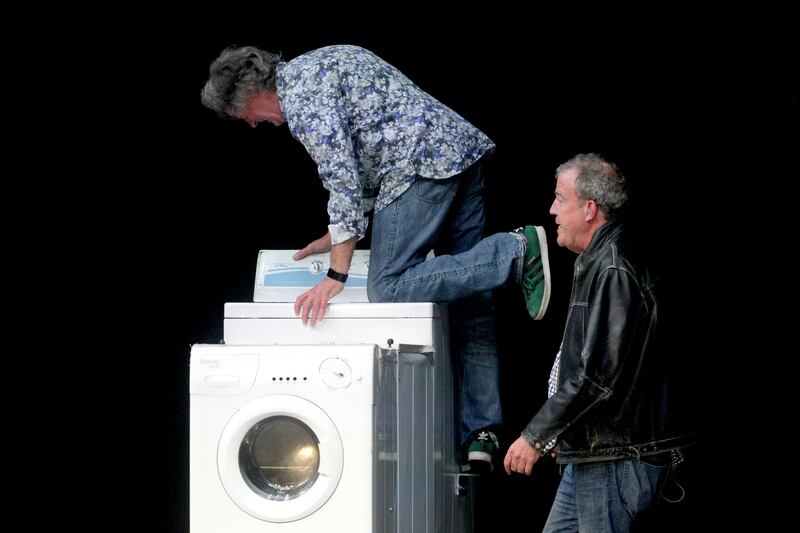 James May (left) and Jeremy Clarkson during the opening night of Clarkson, Hammond and May Live at the Odyssey Arena in Belfast. PRESS ASSOCIATION Photo. Picture date: Friday May 22, 2015. Jeremy Clarkson came in to the theme of boxing anthem Eye Of The Tiger as he made his first public appearance with his former Top Gear co-presenters at the beginning of a global super car tour. The show opened with footage of him throwing a hefty left hand, then the man himself arrived in a hovercraft to the music which once accompanied Irish boxer Barry McGuigan into the ring. The motoring stars said they opted to start the tour in “Bel-Fast” in Northern Ireland because “it is a long way from the Daily Mail offices”. Clarkson, Richard Hammond and James May made their first public appearance together since leaving Top Gear, hosting the live motoring show in Belfast. The trio have not appeared on the same stage since Clarkson left the BBC following a “fracas” with a producer in March but fronted the live stadium spin-off of the hit BBC2 motoring show. See PA story SHOWBIZ Clarkson. Photo credit should read: Liam McBurney/PA Wire