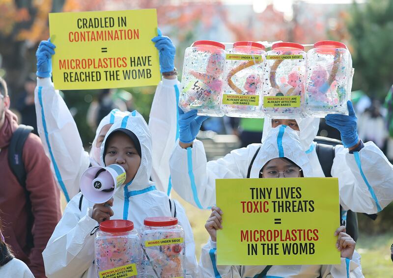 Children attend a rally calling for a strong global plastics treaty ahead of the fifth session of the Intergovernmental Negotiating Committee on Plastic Pollution (Son Hyung-joo/Yonhap via AP)