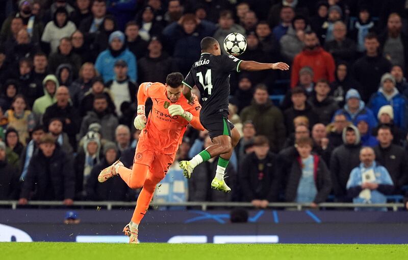 Igor Paixao, right, beats Manchester City goalkeeper Ederson to the ball to set up Feyenoord’s late equaliser